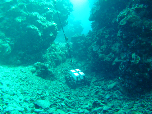 Photo 1 and 2:ROV with the new crawler system on the rugged ocean floor